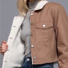 Stay Cozy And Stylish With Our Button Closure Sherpa-Lined Twill Jacket, A Perfect Blend Of Comfort And Sophistication. This Long-Sleeve Jacket Features A Front Button Closure And Is Lined With Soft Sherpa, Making It Ideal For Cooler Days. Key Features: Fabric: Made From One Hundred Percent Cotton, Providing Durability And Comfort Fit: Available In Small, Medium, And Large, Designed For A Relaxed Yet Flattering Silhouette Color Options: Available In Cocoa Design: Features Long Sleeves And A Fron Twill Jacket, Closet Size, Sleeve Jacket, Sherpa Lined, Long Sleeves Jacket, Stay Cozy, Design Features, Color Options, Cocoa