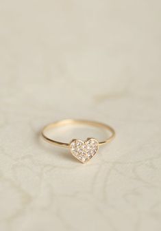 Pavé Diamond Baby Heart Ring $495.00 Dainty White Gold Ring With Pave Setting, Diamond Heart Ring For Promise Occasions, Heart-shaped Diamond Birthstone Promise Ring, Dainty Wedding Ring With Pave Setting, Valentine's Day Fine Jewelry Rings With Single Cut Diamonds, Fine Jewelry Heart Shaped Single Diamond Ring, Diamond Heart Shaped Promise Ring, Heart-shaped Diamond Ring Fine Jewelry, Heart Shaped Single Diamond Ring