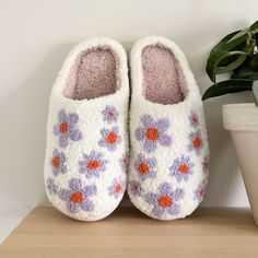 Cozy and Fluffy Slip-On Step into a world of pure comfort with our cozy and fluffy Purple Flowers Slip-on Slippers! These slip-on slippers give your feet a soft, cushiony embrace. Perfect for those cozy moments at home, they are your go-to for unbeatable warmth and comfort. Non-slip Sole For Safety and Style Enjoy the perfect blend of safety and style as you stroll through your home! These flower slippers come with a non-slip sole that grips various surfaces with ease, giving you confidence and stability with every step. Chic Floral Design These fashionable slippers feature a vibrant purple flower design, blending comfort with style effortlessly. Not only are they a cozy accessory, but they also add a touch of flair to your loungewear. Product Details Pattern: FlowersType: Slip-onSeason: A Comfortable Slip-on Slippers With Soft Texture, Comfortable Slippers With Soft Texture And Round Toe, Soft Texture Indoor Slippers With Round Toe, Comfortable Platform Slippers, Comfy Fluffy Slippers With Round Toe, Comfortable Fluffy Slippers With Round Toe, Cozy Slippers With Soft Texture And Round Toe, Fluffy Slip-on Slippers For Indoor Use, Fluffy Round Toe Slippers For Loungewear