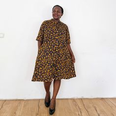 We love the speedwell dress :-) Our loose fit colourful dresses made out of non-stretchy African print are perfect for you in case you are looking for a style idea that is versatile, comfortable, and looks fabulous year-round. All materials used to design the dresses are sourced in Kenya.  MEASUREMENT GUIDE:  We recommend asking questions about sizes or you can take your own measurements (at the bust) if unsafe. Since its an A- Line, you only need to ensure that you have the right fit for the bu Dress Shirt Dress, Dress Ankara, Ankara Dress, Kitenge, Dark Blue Background, Beautiful Skirts, Dress With Pockets, Dress Clothes For Women, African Print