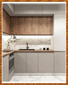 an image of a kitchen setting with marble counter tops and wood cabinetry on the walls