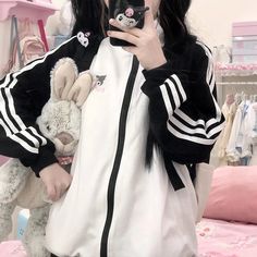 🌟 Kawaii Comfort: Sanrio Oversized Zip-up Hoodie 🎀 Cuteness and Cozy Vibes: The Sanrio Oversized Zip-up Hoodie is a delightful creation designed for those who want to wrap themselves in kawaii charm and comfort. This hoodie is perfect for individuals who appreciate the adorable characters of Sanrio and want to showcase their love for all things cute. ✨ Superior Comfort: Meticulously crafted to ensure top-notch quality and style, this oversized hoodie offers exceptional warmth, comfort, and dur Kawaii Hooded Sweatshirt For Fall, White Harajuku Style School Outerwear, Harajuku Style White Outerwear For School, White Harajuku Outerwear For School, Cute Oversized Hoodie Outerwear, Fall Kawaii Hooded Sweatshirt, Fall Hooded Kawaii Sweatshirt, White Kawaii Outerwear For Winter, White Harajuku Hoodie For Fall