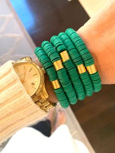 "This listing is for 1 Jade Bracelet. Each bracelet is hand-beaded with African clay discs and accented with a brushed gold cylinder bead. The bracelet is made with stretch elastic which makes it comfortable and easy to wear. My bracelets are made to fit an average wrist size of 6.5\"-7\". Take a look around my shop for additional colors to add to your stack! The more the better!" Beads Candy, White Bracelets, Stackable Bracelets, Jade Bracelet, Candy Stripes, Heishi Beads, Photo Bracelet, Pink Flamingos, Hand Beading