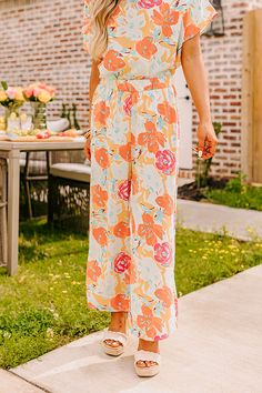 - Spend hot summer days and sweet summer nights in luxe style with these breezy pants! - Unlined semi-sheer material with a blue, pink, and orange hued floral print - An elastic waistband - A relaxed silhouette that ends in straight hemlines Two Piece Set Pants, Luxe Style, Bold Floral Print, Neck Bodycon Dress, High Waist Pants, Top Pants Set, Sweet Summer, Mini Slip Dress, Sheer Material