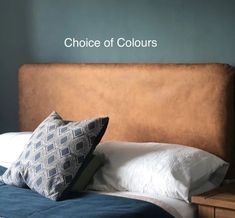 a bed with pillows on top of it and the words choice of colours above it