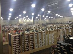 a large room filled with lots of boxes and lights