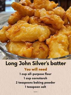 a bowl filled with fried food on top of a table