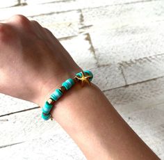 The bracelet has 2 different colors that are teal and light blue. You can change the color and the bracelet can be changed to the right size for your wrist. Ocean-inspired Turquoise Beaded Bracelets For Gift, Ocean-inspired Turquoise Bracelets As Gift, Turquoise Ocean-inspired Bracelets For Gift, Turquoise Ocean-inspired Bracelets As Gift, Turquoise Stretch Bangle Bracelet As Gift, Turquoise Stretch Bangle Bracelet For Gift, Trendy Turquoise Bracelets For Vacation, Trendy Turquoise Vacation Bracelets, Adjustable Turquoise Ocean-inspired Bracelet