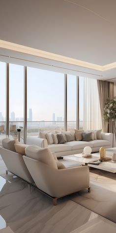 a living room with couches, tables and chairs in front of large windows overlooking the city