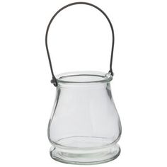 a clear glass vase with a handle on the side and a black cord hanging from it