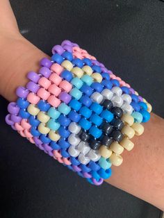 Custom kandi cuff with character designs! Bluey and Bingo Fun Handmade Blue Beaded Bracelets, Fun Blue Handmade Beaded Bracelets, Fun Blue Handmade Bracelets, Fun Blue Beaded Bracelets, Fun Blue Beaded Bracelet, Tab Jewelry, Bluey And Bingo, Kandi Cuff, Kandy