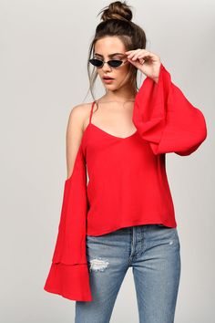 With Wide, Double Layer Sleeves, You Won'T Be Able To Resist Making Shapes With The Red Jillian Cold Shoulder Blouse. A Peasant Blouse You Can Wear In The Evening, The Backless Blouse Has Deep Cold Shoulder Cutouts And Delicate Shoulder Straps, With Ties At The Back. Live The Drama. Fall Party Blouse With Cold Shoulder, Fall Party Cold Shoulder Blouse, Red Off-shoulder Top For Night Out, Fall Off-shoulder Blouse With Blouson Sleeves, Off-shoulder Blouse With Blouson Sleeves For Fall, Fall Blouse With Blouson Sleeves And Off-shoulder Design, Red Off-shoulder Top For Evening, Cold Shoulder Blouse For Night Out In Fall, Red Off-shoulder Blouse For Party