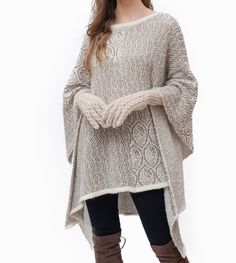 Looking for a gift that will make you feel special? For that good friend or someone special Beautifully woven, incredibly soft, with a silky-smooth texture. Our warm alpaca wool capes are sure to chase the winter blahs away, and they are available in different colors! Handmade in Perú with 90% baby alpaca & 10% nylon; baby alpaca is one of the finest luxury fibers in the world. You won’t just wear a fashionable piece, but also some of Peru’s treasures and mysteries, reserved for Inca royalty. Al Elegant Beige Sweater With Soft Texture, Oversized Alpaca Poncho For Winter, Cozy Knitted Wool Poncho, Oversized Cashmere Poncho For Winter, Oversized Beige Cashmere Sweater, Cozy Alpaca Poncho For Winter, Wool Poncho With Long Sleeves For Winter, Beige Knit Poncho, Beige Knit Poncho One Size