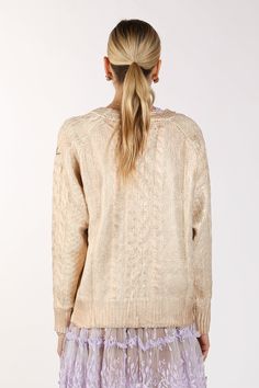 Metallic gold foil coated Low gauge knit Embellished gold button closure Ribbed knit cuffs and hems Raglan shoulder Regular fit Imported 100% ACRYLIC Model is 5' 10.5" Wearing a One Size Caring for your clothes is caring for the environmentWash your clothes with lower temperature and delicate spin cycles. It helps to maintain the color, shape and structure of the fabric. At the same time it reduces energy consumption that is used in care processes ONE SIZE MM4013_CHAMPAGNE_ALL Elegant Gold Sweater For Winter, Elegant Gold Winter Sweater, Gold Knit Sweater For Winter, Gold Knit Winter Sweater, Energy Consumption, Spin Cycle, Knit Cuff, Gold Buttons, Metallic Gold