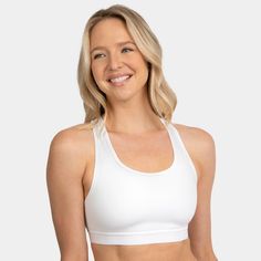 Introducing the Fruit of the Loom Medium Impact Wireless Sports Bra, the perfect addition to your workout wardrobe. This full coverage sports bra provides you with the necessary support and comfort during low to medium impact activities such as yoga, cycling, walking and lounging. Made with a non-padded design, this sport bra is perfect for those who prefer a natural look and feel. The smoothing racerback and wide comfort straps ensure that the bra stays in place while you move, allowing for a f Workout Racerback Bra With Built-in Padding, Racerback Sports Bra With Built-in Padding For Light Exercise, Supportive Racerback Sports Bra With Built-in Padding, Athleisure Sports Bra With Built-in Padding And Medium Support, Supportive Activewear With Built-in Bra For Light Sports, Supportive Sports Bra With Built-in Padding For Light Sports, Supportive Sports Bra With Built-in Bra For Light Sports, Athletic Fit Sports Bra With Built-in Bra For Training, Functional Gym Bra With Built-in Padding