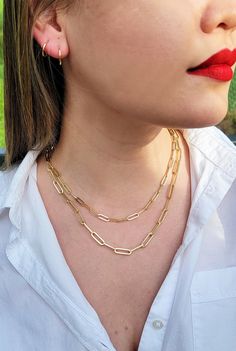 "This paper clip chain is perfect for the classy lady who likes to stay on trend. This chain is made from solid 14k gold and is held by a lobster clasp - it cannot get more stylish than that. This is 14k gold necklace that gives you option for everyday or special occasion wears. It can easy match with your other gold and silver necklace. You are getting 14k gold paper clips necklace for birthday anniversary, father day mother day Christmas time or your wife your kids and your love for valentines Gold Paperclip Double Chain Jewelry, Paperclip Shaped Double Chain Jewelry As Gift, Elegant Paperclip Bracelet With Box Chain, Minimalist Double Chain Paperclip Jewelry, Elegant Yellow Gold Paperclip Chain Necklace, Classic Gold Chain Jewelry In Paperclip Shape, Classic Paperclip Gold Chain Jewelry, Elegant Paperclip Chain Necklace For Everyday, Elegant 14k Gold Rectangular Chain Necklace