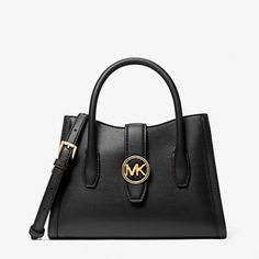 Michael Kors Gabby Small Faux Leather Satchel Color Black Nwt Authentic Meet Gabby: A Modern Take On The Satchel. Finished With A Gleaming Silver-Tone Logo Charm, This Classic Style Feels Fresh Thanks To A Curved Top Opening And A Front Flap Fastening. A Removable Shoulder Strap Lets You Go Hands-Free. Satchel Faux Leather 75% Polyurethane/20% Polyester/3% Pigment/2% Fibers Silver-Tone Hardware 9.75”W X 7”H X 3.5”D Handle Drop: 3.5” Exterior Details: Front Slip Pocket, Removable Strap Interior D Leather Satchel With Logo Hardware For Shopping, Chic Double Handle Satchel With Logo Hardware, Formal Michael Kors Bag With Logo Hardware, Black Shoulder Bag With Logo Hardware For Work, Evening Satchel With Logo Hardware, Chic Michael Kors Bag With Logo Hardware, Elegant Michael Kors Satchel For Work, Chic Michael Kors Satchel For Evening, Michael Kors Evening Bags With Logo Hardware