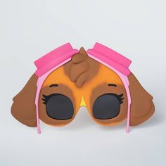 a pair of sunglasses with a dog's head and pink ribbon on the side