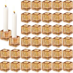 a set of twelve wooden candle holders with candles