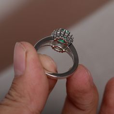 This is a gorgeous handmade creation. Its beauty is its simplicity & Elegance. The 6*8mm lab emerald is crafted in solid sterling silver and with rhodium plated. It's made to order and it will take about 7-10 days to make it. All item is sent in a beautiful gift box You can realize more lovely stuff clicking the link https://www.etsy.com/shop/knightjewelry?refshopsection_shophome_leftnav Please leave the correct address and you phone number for delivering successfully. Wedding Emerald Ring In 14k White Gold, Silver Emerald Ring For Proposal, Silver Proposal Ring With May Birthstone, Cubic Zirconia Emerald Cut Ring With Halo Design, Silver Emerald Ring With Princess Cut, Elegant Silver Emerald Ring For Proposal, Silver Emerald Ring With Princess Cut And Prong Setting, Silver Emerald Ring Princess Cut, Classic Silver Emerald Ring For Proposal