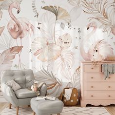 a living room with flamingos and palm leaves on the wall, a chair and ottoman