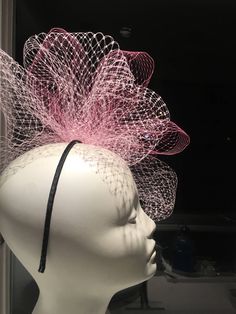 Pink Fascinator- Birdcage Fascinators- Kentucky Oaks- Wedding headpiece- Derby Days - Horse Race Hat- Cocktail Hat Hello, This birdcage net bow fascinator has a two tone colors but can be made in solid colors. It's center is a 2.5 inch brooch. Shown is pink mix with pink/Green center. . It's perfect for a wedding, derby party or any black tie event. It is on a matching stainless steel headband that's wrapped with ribbon, its adjustable and very comfortable. -------------------------------------- Fitted Tulle Headpieces For Parties, Spring Party Tulle Headpiece, Tulle Headpiece For Kentucky Derby Party, Whimsical Adjustable Headband For Wedding, Adjustable Tulle Fascinator For Party, Whimsical Pink Headband For Wedding, Party Tulle Headband Fascinator, Pink Structured Crown Headpiece For Wedding, Party Tulle Headband