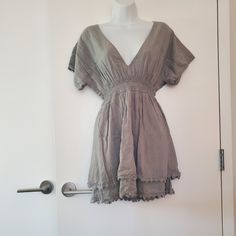 Size Large. Perfect Condition. Green-Grey Color. Very Light Breathable And Stretchy Material. Gray V-neck Mini Dress For Summer, Gray Short Sleeve Vacation Dress, Summer Gray V-neck Mini Dress, Gray Short Sleeve Dress For Vacation, Gray V-neck Mini Dress For Spring, Casual Gray Beach Dresses, Casual Flowy Gray Dress, Gray Mini Beach Dress For Summer, Gray Mini Dress For Beach In Summer