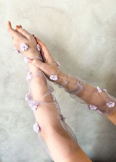 These ethereal tulle bridal gloves are more than just accessories--they're a declaration of style and sophistication. Crafted from delicate tulle in soft romantic lilac hues, the Claramay fingerless bridal tulle gloves add a dash of whimsy and romance to your bridal ensemble. * DETAILS * > Designed and handmade in Australia. Worldwide shipping > Soft bridal tulle, fabric flowers, hand beading > Measurement: One size, custom sizes available > Made to order: Production times in tabs below * MADE T Wedding Gloves Fingerless, Lilac Gloves, Fairy Gloves, Purple Theme Wedding, Flower Gloves, Hades Persephone, Tulle Gloves, Purple Gloves, Purple Tulle