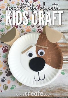 a paper plate that has a dog face on it