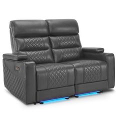 the reclining loveseat with blue lights on it