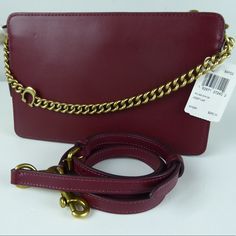 Coach Crossbody Signature Chain Crossbody Refined Calf Leather Chain Handle W About A 4.25” Drop Top Zip Closure W Coach Branded Pull Tab Detachable Crossbody Strap In Matching Leather W About 21” Drop 2 Side Magnetic Snap Pockets Bag About 9x5.75x2.5” Slip Inside Pocket Great In Hand, On Shoulder Or As Crossbody Coach Badging Brand New W Tags Pricing Is Fair & Quite Firm . Let Us Know If You Have Any Questions. Rectangular Wallet On Chain With Metal Hardware, Coach Rectangular Wallet On Chain With Strap, Coach Crossbody Bag With Chain Strap, Coach Leather Crossbody Wallet On Chain, Coach Luxury Wallet On Chain For Formal Occasions, Luxury Coach Wallet On Chain For Formal Occasions, Rectangular Wallet On Chain With Chain Strap For Office, Coach Rectangular Chain Wallet With Detachable Strap, Coach Leather Wallet On Chain With Chain Strap