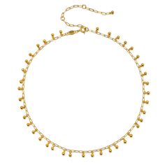 Joy arrives on the whisper of a breeze, the sound of singing in our ears. An 18KT gold plate choker necklace features delicate round balls that dance on the skin. Wear this adjustable choker necklace alone, or as part of your unique layered look. 14'' with 3'' Extension Chain Pendant size: 4mm 18KT Gold Plated Brass Dainty Adjustable Choker With Gold Beads, Adjustable Gold Beads Choker, Adjustable Delicate Gold Choker, Adjustable Ball Chain Necklaces, Delicate Gold Choker With Tiny Beads, Adjustable Gold Beaded Chain Choker, Satya Jewelry, Chain Pendant, Layered Look