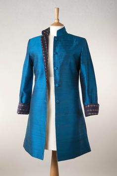 Raw silk jacket in turquoise. With sari lining and turn-back cuffs For parties, the opera and celebrations http://www.maharanitrading.com Royal Clothes, Clothes For Women Over 50, Silk Route, Garden House, Petrol Blue, Long Tunic, Line Jackets