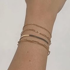 A delicate gold Figaro chain bracelet bracelet. Wear on its own or layer with our Paperclip bracelet. This Figaro bracelet makes for the perfect layering piece. BUY 2, GET 1 FREE. Coupon applied at checkout. - Width: 1.3 mm. - Adjustable chain 6 to 8 in.- Shower safe / Tarnish resistant / Hypoallergenic- Made in gold vermeil: a thick 18k gold layer on sterling silver.- 1 Year warranty Minimalist Gold-tone Chain Bangle Bracelet, Gold-tone Minimalist Bangle Chain Bracelet, Gold Plated Bracelets With Paperclip Chain, Minimalist Stackable Chain Bracelet For Layering, Everyday Stackable Gold Plated Chain Bracelet, Everyday Stackable Gold-plated Chain Bracelet, 14k Gold Filled Bracelets For Layering, Layering Bracelets With Delicate Chain, Dainty Stackable 14k Gold Filled Chain Bracelet