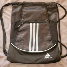 Brand New Black Adidas Drawstring Backpack Never Worn Or Used Casual Black Backpack For Gym, Black Drawstring Backpack Bag, Black Drawstring Travel Bag, Black Drawstring Gym Bag, Black Casual Gym Backpack, Casual Black Gym Backpack, Adidas Gym Bag For Back To School, Black School Backpack With Drawstring, Black Drawstring Backpack For Outdoor Activities