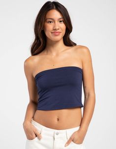 Tilly's Tube Top. Solid Color. Sleeveless. Cropped Fit. 60% Cotton, 36% Rayon, 5% Spandex. Machine Wash. Imported. Model Is Wearing A Size Small. Model Measurements:height: 5'6" Bust: 32"waist: 26"hips: 35" | Tillys Tube Top Casual Tube Top With Built-in Bra, Casual Strapless Camisole With Built-in Bra, Seamless Stretch Sleeveless Tube Top, Seamless Bandeau Tank Top With Stretch, Seamless Stretch Bandeau Tank Top, Stretch Seamless Bandeau Tank Top, Trendy Seamless Bandeau Tops, Summer Stretch Tank Tube Top, Stretch Tank Tube Top For Summer