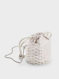 White Beaded Chain-Handle Bucket Bag - CHARLES & KEITH US White Shoulder Box Bag With Dust Bag, Beige Evening Box Bag With Dust Bag, Bucket Box Bag With Detachable Strap For Gift, Bucket Box Bag With Detachable Strap As Gift, Party Evening Bag With Detachable Handle, Bucket Shape, Party Bucket Evening Bag With Detachable Handle, Gift Bucket Box Bag With Detachable Strap, White Square Box Bag With Dust Bag, Beige Bucket Box Bag As Gift