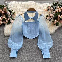 Detachable lapel shirt, stitching puffer sleeves short chic blouseMaterial:blendedColor:white,black ,blue,apricotStyle:sexyFeatures:puffer sleeveSize(CM):freelength:24,bust:60-80,waist:60-70,sleeve:60&ltp&gtNote:Due to different measurement methods,there will be 1-3 error(unite:cm), please understand.</p>&ltbr/> Spring Party Blouse With Splicing, Elegant Party Tops With Splicing Detail, Elegant Party Tops With Splicing, Chic Blue Patchwork Blouse, Chic Blue Blouse With Patchwork, Spring Puff Sleeve Patchwork Tops, Spring Patchwork Puff Sleeve Tops, Elegant Spliced Tops For Summer, Long Sleeve Patchwork Blouse For Party