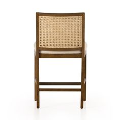 an upholstered wooden chair with woven seat padding and backrest, viewed from the front