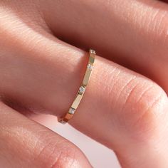 Here's our dainty diamond stacking wedding band for women. This 10K 14K or 18K gold thumb ring has an elegant simple trendy style that pairs well with engagement ring for newlywed women. This thin gold ring can also be a beautiful thumb ring or midi ring for you. This custom and made to order ring would also be great with solitaire and diamond wedding band for your wife, mom or grand mother. This comfort fit band, adorned with simulated diamonds, will be your everyday ring and so special with la Unique Eternity Ring, Gold Thumb Rings For Women, Simple Gold Rings Everyday, Dainty Wedding Rings, Gold Thumb Ring, Thumb Rings For Women, Simple Ring Design, Gold Thumb Rings, Gold Wedding Bands Women