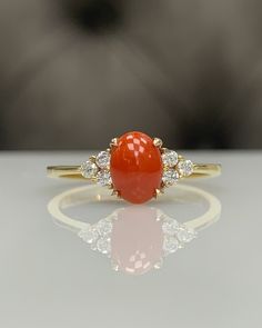 For more gorgeous jewelry, please visit : https://www.etsy.com/shop/MastikaJewelry Certificated Coral with Diamond Dainty Classic Engagement Ring in 14K Solid Gold, Cocktail Cluster Ring, Genuine Gemstone, Best Gift Idea ◎ Details ◎ ○ Gemstone Details .Natural CERTIFICATED CORAL Oval Cut approx 7x5 mm approx. 0.70 ct .Conflict Free DIAMOND Round Cut 1.70 mm 6 pcs F/G VS/SI total approx. 0.10 ct ○ Gold Details 14K Solid Gold Weight of Ring : approx 2.00 gr Made to Order HANDMADE ITEM ○ Upgrade to Pagadam Rings For Women, Elegant Gold Jewelry With Red Coral, Elegant Coral Oval Rings, Coral Engagement Ring, Coral Ring Designs For Women, Red Coral Ring Design Women, Coral Rings, Pearl Ring Design, Coral Stone Ring