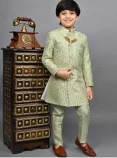 Pls Check The Size Chart before placing the Order  Kids Indo-western Sherwani And Dhoti In Blue  * Style - Kids Indo-western Sherwani * Fabric - Premium Silk Blend * Color - Yellow/Green/Beige * Work Type - Embroidered , Mandarin Collar, Straight Cut Style * Bottom - Paired with Matching Silk Pant Long Sleeve Party Sets For Transitional Season, Long Sleeve Pista Green Sets For Navratri, Pista Green Long Sleeve Sets For Navratri, Sets With Zari Work For Navratri Celebration, Eid Party Sets With Dori Work, Navratri Celebration Set With Zari Work, Party Nehru Jacket With Zari Work For Festivals, Festive Nehru Jacket With Zari Work For Parties, Nehru Jacket With Zari Work For Party And Festivals