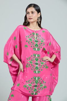 Pink kaftan with contrasting green floral prints on front and Mughal painting inspired printed back. Comes with coordinating floral printed pant. - Aza Fashions Festive Silk Kaftan With Digital Print, Silk Digital Print Kaftan For Eid, Silk Digital Print Festival Kaftan, Bollywood Style Embroidered Spring Kaftan, Bollywood Style Embroidered Kaftan For Spring, Spring Bollywood Embroidered Kaftan, Festive Digital Print Kaftan For Eid, Green Silk Tunic Kaftan, Bollywood Style Kaftan With Printed Motifs