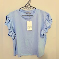 Nwt Zara Powder Blue Tee With Ruffled Sleeve. Size M. Smooth Cotton. Bday Wishlist, White Sleeveless Blouse, School Clothes, Zara Shirt, Sweater Crop, Leopard Print Top, Ruffle Shirt, Birthday List, Blue Tee