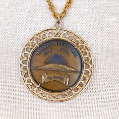 Bicentennial Coin Necklace  Please see pictures for size and details Vintage Coin Necklaces, Vintage Necklace With Hallmark And Round Pendant, Vintage Hallmark Round Pendant Necklace, Vintage Coin Necklaces For Formal Occasions, Vintage Coin Necklace For Formal Occasions, Vintage Necklace With Round Pendant And Hallmark, Vintage Bronze Necklaces For Anniversary, Formal Engraved Medallion Necklace, Engraved Medallion Necklace For Formal Occasions