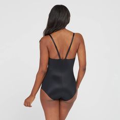 This versatile bodysuit is the ultimate solution for low-back dresses! The flawless-finish fabric is lightweight, cling-free, and offers 360 degrees of comfortable, single-layer shaping for a sleek, all-over feel. And, best of all? The innovative design features lightly padded, fit-flexible wireless cups and adjustable, convertible straps for a variety of styling options Second-skin Smoothing Bodysuit For Swimming, Smoothing Second-skin Bodysuit For Swimming, Sleek Second-skin Shapewear With Built-in Bra, Fitted Full Coverage Bodysuit With Built-in Bra, Fitted Backless Leotard With Built-in Bra, Fitted Smoothing Bodysuit For Swimming, Fitted Full Coverage Seamless Leotard, Seamless Fitted Full Coverage Leotard, Seamless Full Coverage Fitted Leotard