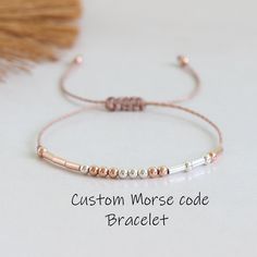 Dainty personalized Morse code bracelet - special gift with your custom secret message!  ✦ Makes a great gift for sister, best friend, mom, wife, aunt, bridesmaid ✦ Adjustable up to approx 9 3/4 inches (25cm) with sliding knot ✦ 925 Sterling Silver beads ✦ 925 Sterling Silver 18K Rose Gold beads ✦ Round beads represent dots, tubes dashes ☆ Find more Morse code bracelets: https://www.etsy.com/shop/ANINAjewelry Thank you for stopping by :) Mores Code Bracelets, Secret Message Jewelry, Morse Code Bracelets, Code Bracelets, 1st Mothers Day, Mens Bracelet Personalized, Valentines Bracelets, Sister Bracelet, Step Mom Gifts