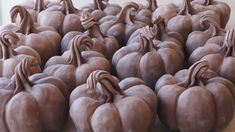 chocolate pumpkins sitting on top of each other