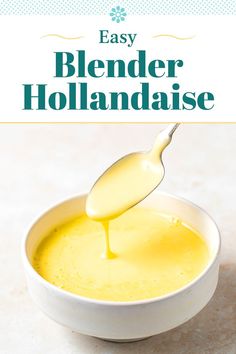 a white bowl filled with hollandaise sauce being drizzled over it