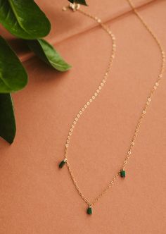 We’re in our Color Era and we’re vibing hard with these colorful stones right now. Gemma Trio is inspired by our Quinate Necklace, just a more colorful version! Three 2x4mm stones drop from our delicate cable chain. Necklace measures 17" + 1" extender. Available in Moss (African Green Jade) + Seafoam (Green Aventurine) + Ash (Black Labradorite). Available in 14kt Gold Fill + Sterling Silver. Shop the entire Gemma Collection. Handmade in Eau Claire, WI. Our jewelry is handmade so each piece will Trio Necklace, Everyday Wear Jewelry, Colorful Stones, Black Labradorite, Cable Chain Necklace, Silver Shop, Green Jade, Jewelry Cleaner, Seafoam Green